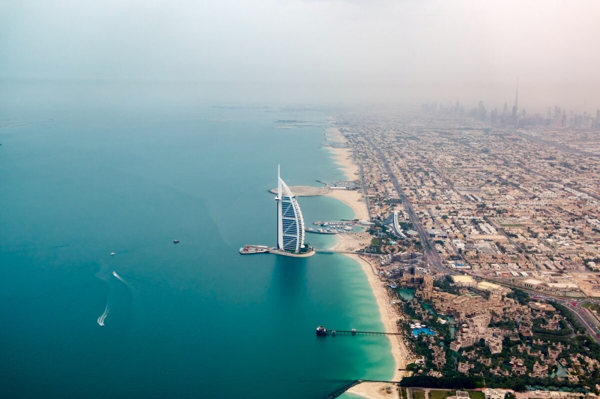 an aerial view of the burj al arab in the middle of the ocean